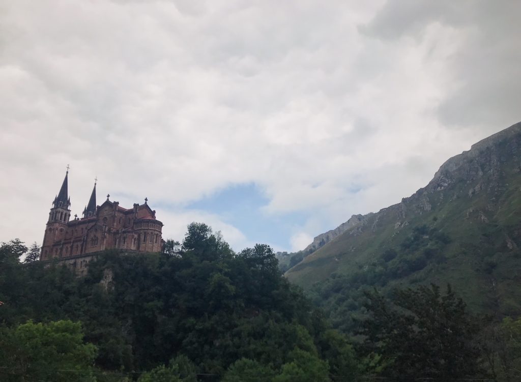 a Cathedral looms over the valley of Covadonga Asturias.