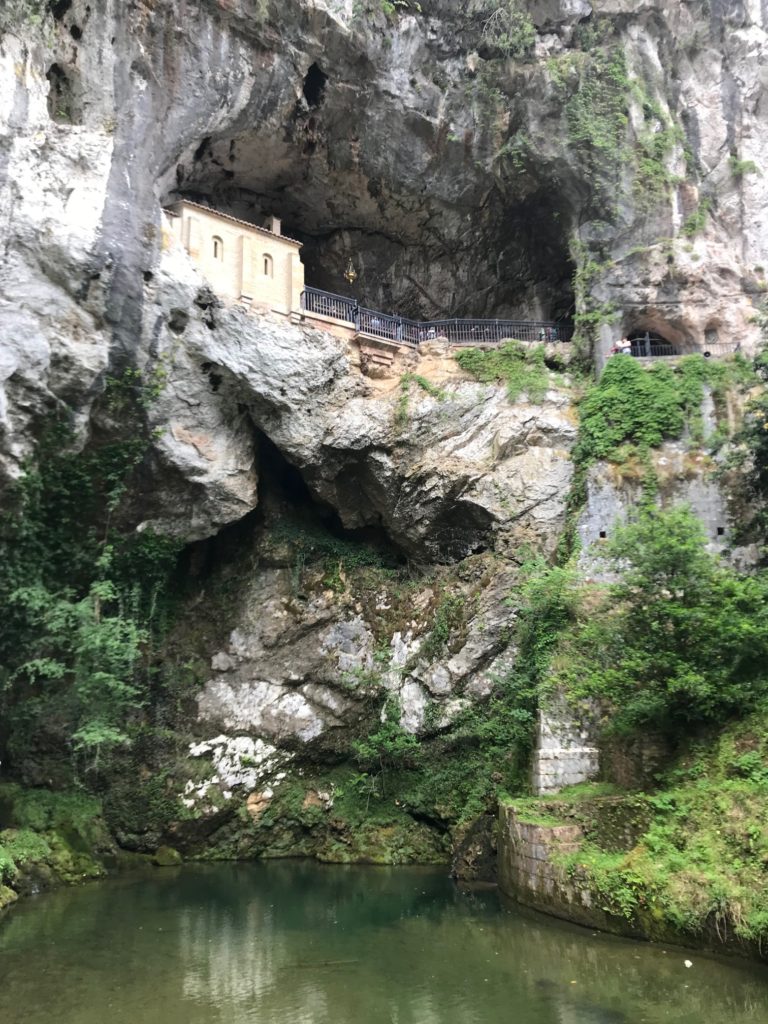 The santuario de Covadonga Asturias sits in a holy cave, unlike anything I have ever seen before