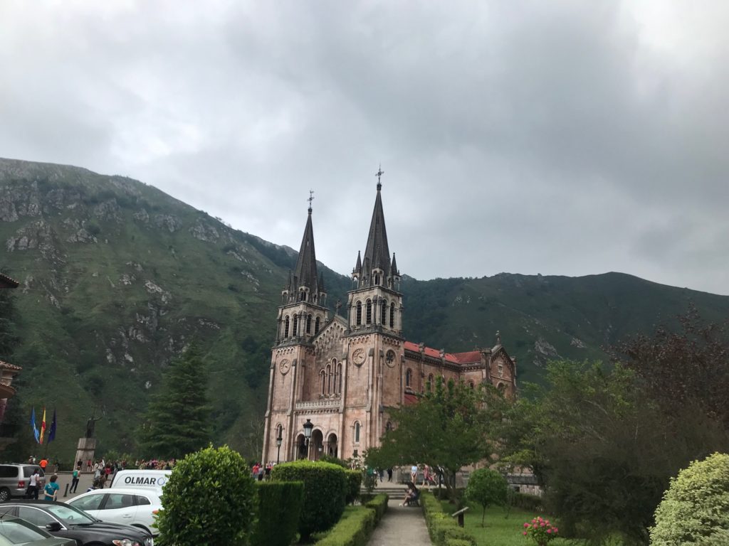 The beautiful pink limestone basilica overlooks the Covadonga Valley. 