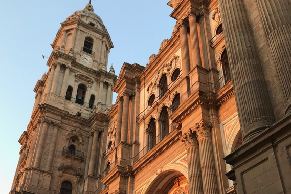 The catedral de Málaga glows at sunset, and is a must see attraction with 2 days in Málaga.