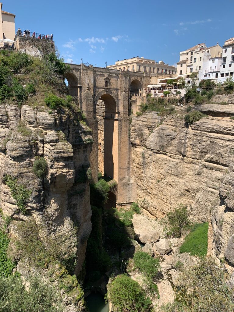 Puente Nuevo connecting two sheer sides of the Tajo Canyon. is an architectural feat.