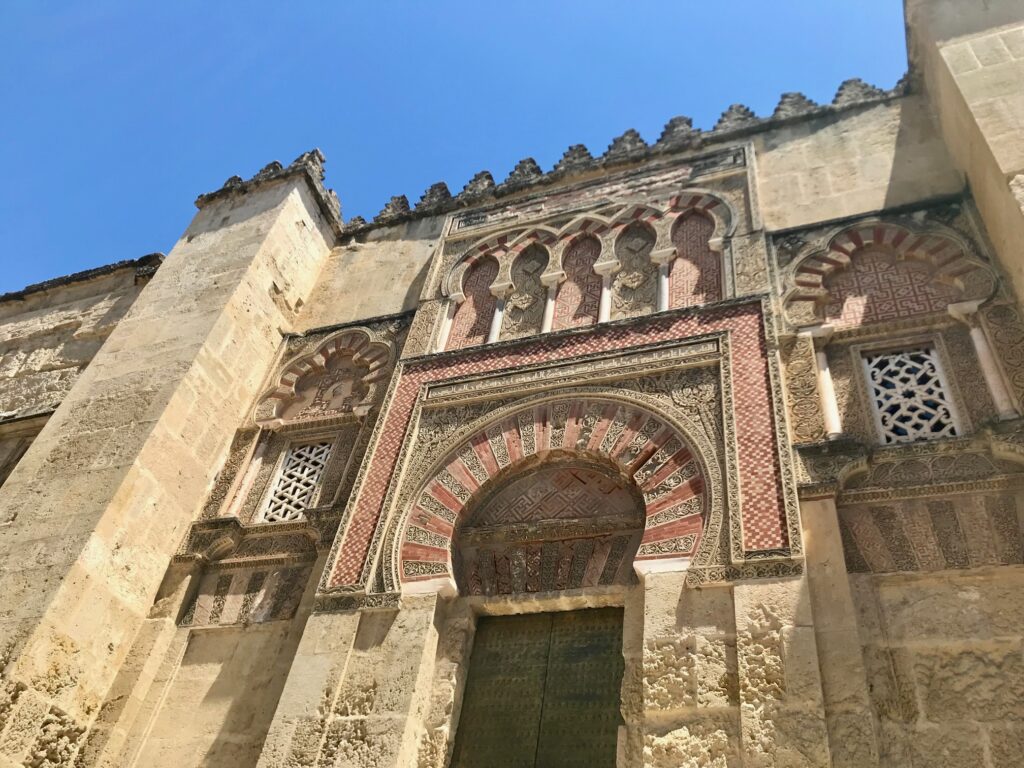 The facade of the mezquita-catedral in Córdoba stands tall over city center