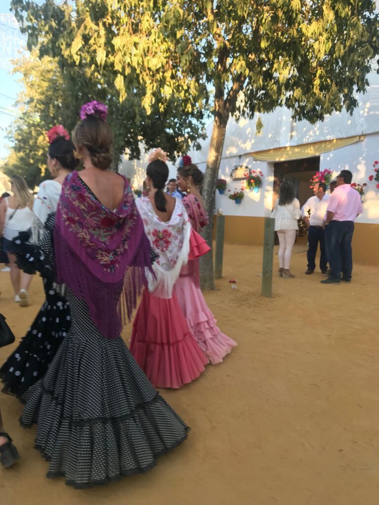 The traditional attire for La Feria de Córdoba includes the most magnificent dresses. 