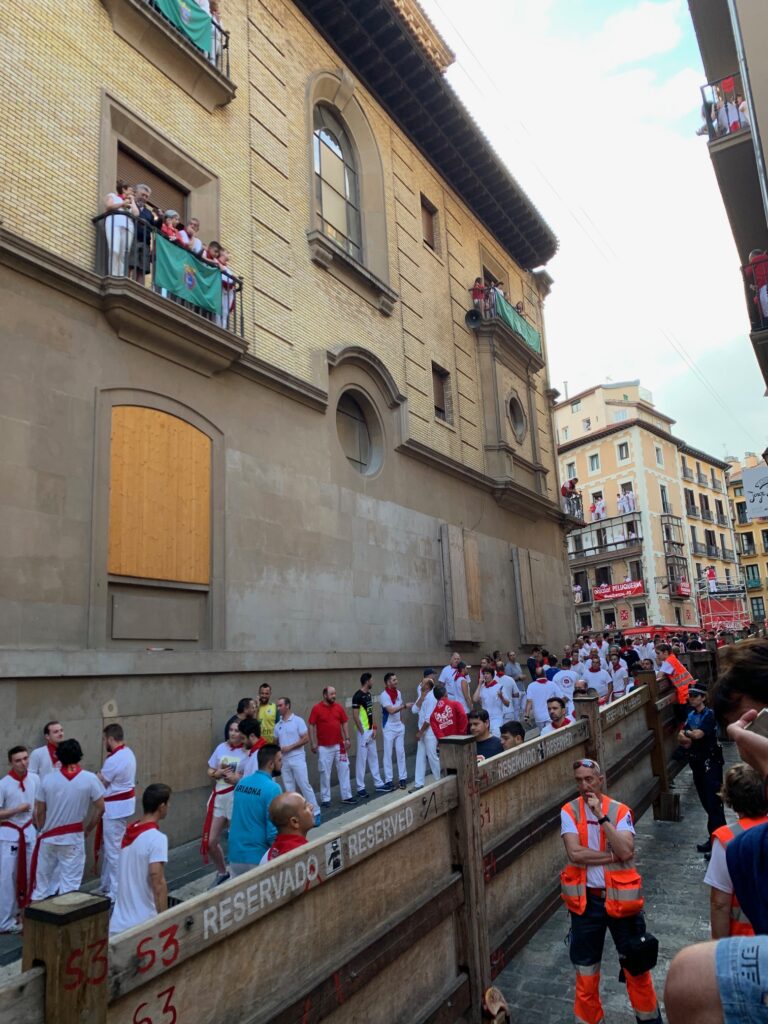 Runners await the cannon that marks the beginning of the running of the bulls in honor of San Fermín. 
