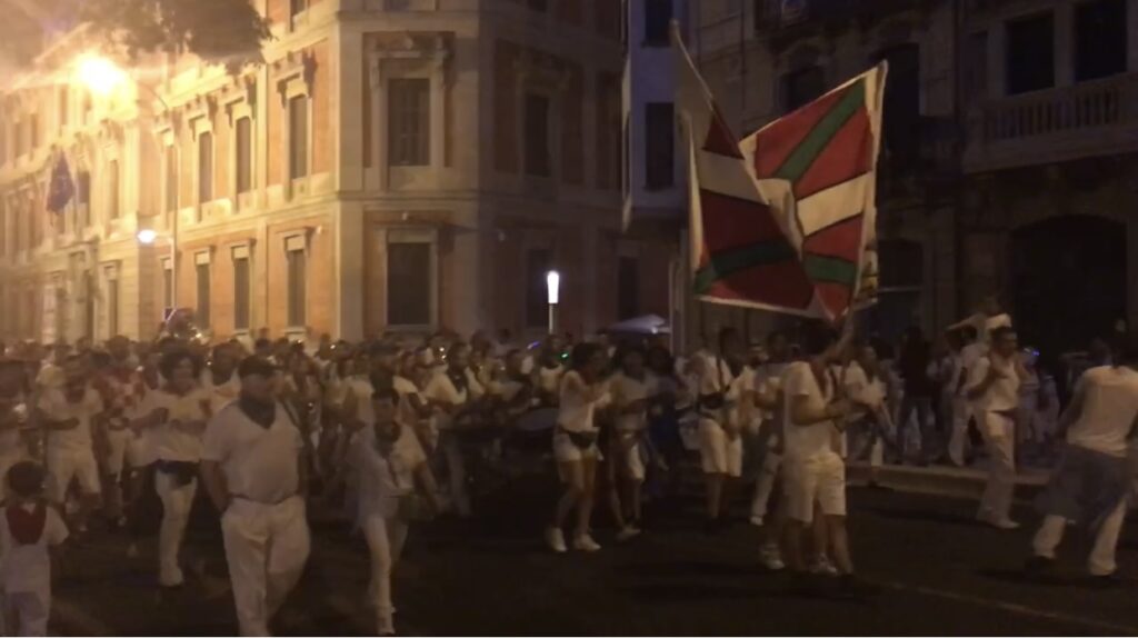 A Midnight marching band takes over the streets of Pamplona during La fiesta de san fermin